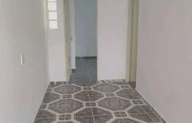 Imagem: A casa possui 2 Dormitórios, 1 Banheiro, 1 Vaga na garagem