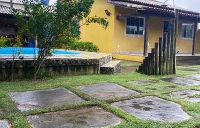 Imagem: A casa possui 3 Dormitórios, 3 Vagas na garagem e está localizado