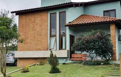 Imagem: A casa em condomínio possui 3 Dormitórios, 3 Banheiros, 2