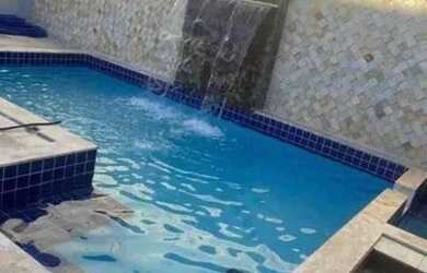 Imagem: A casa possui 2 Dormitórios, 1 Banheiro, 2 Vagas na garagem