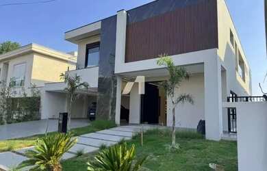 Imagem: A casa em condomínio possui 5 Dormitórios, 5 Banheiros, 5