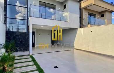 Imagem: A casa possui 4 Dormitórios, 5 Banheiros, 2 Vagas na garagem