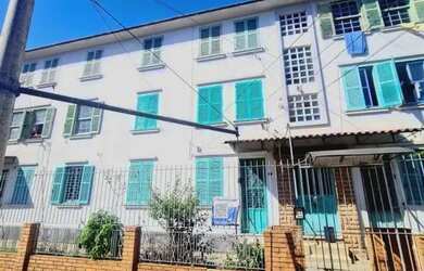 Imagem: O apartamento possui 3 Dormitórios, 1 Banheiro, 1 Vaga na garagem