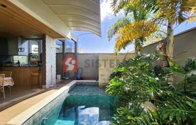 Imagem: A casa em condomínio possui 4 Dormitórios, 5 Banheiros, 2