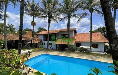 Imagem: A casa em condomínio possui 5 Dormitórios, 5 Banheiros, 5