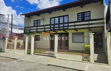 Imagem: A casa à venda possui 3 Dormitórios, 3 Banheiros, 3 Vagas