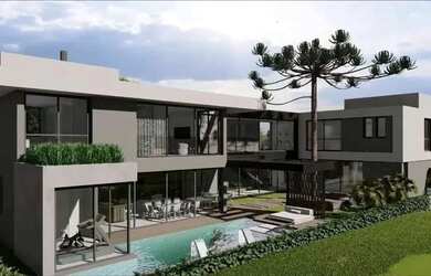 Imagem: A casa em condomínio possui 4 Dormitórios, 5 Banheiros, 5