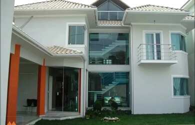 Imagem: A casa em condomínio possui 4 Dormitórios, 5 Banheiros, 4