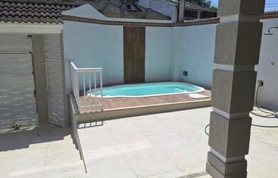 Imagem: A casa em condomínio possui 4 Dormitórios, 5 Banheiros, 2