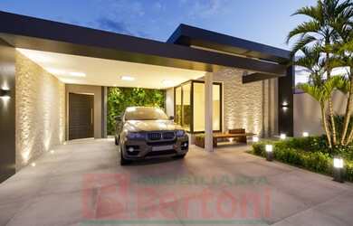 Imagem: A casa possui 3 Dormitórios, 1 Banheiro, 2 Vagas na garagem