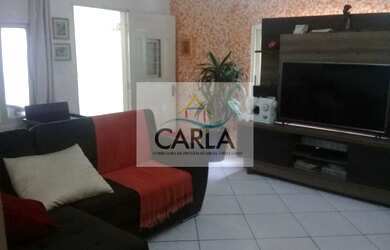 Imagem: A casa possui 3 Dormitórios, 1 Banheiro, 2 Vagas na garagem