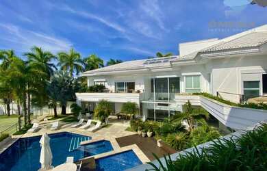 Imagem: A casa em condomínio possui 5 Dormitórios, 5 Banheiros, 5