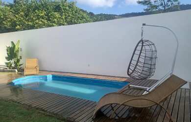 Imagem: A casa em condomínio possui 3 Dormitórios, 2 Banheiros, 4