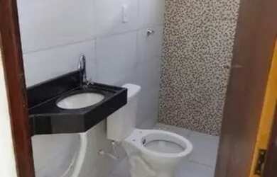 Imagem: A casa possui 2 Dormitórios, 1 Banheiro, 1 Vaga na garagem