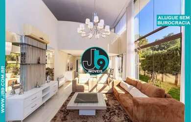 Imagem: A casa possui 4 Dormitórios, 4 Banheiros, 5 Vagas na garagem