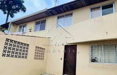 Imagem: A casa possui 3 Dormitórios, 2 Banheiros, 2 Vagas na garagem