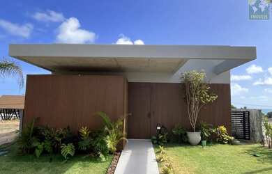 Imagem: A casa possui 3 Dormitórios, 5 Banheiros, 2 Vagas na garagem