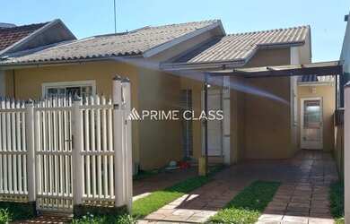 Imagem: A casa possui 3 Dormitórios, 2 Banheiros, 1 Vaga na garagem