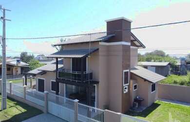 Imagem: A casa possui 4 Dormitórios, 4 Banheiros, 169m² de Área e