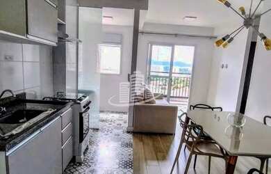 Imagem: O apartamento possui 2 Dormitórios, 1 Banheiro, 1 Vaga na garagem