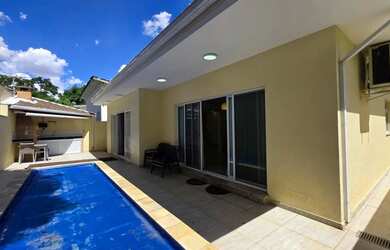 Imagem: A casa possui 4 Dormitórios, 5 Banheiros, 5 Vagas na garagem