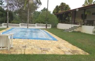 Imagem: A casa em condomínio possui 4 Dormitórios, 4 Banheiros, 5