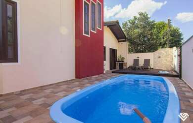 Imagem: A casa à venda possui 4 Dormitórios, 2 Banheiros, 4 Vagas