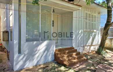 Imagem: A casa possui 2 Dormitórios, 1 Banheiro, 1 Vaga na garagem