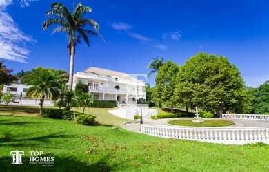 Imagem: A casa em condomínio possui 5 Dormitórios, 5 Banheiros, 5