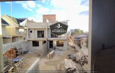 Imagem: A casa possui 3 Dormitórios, 2 Banheiros, 2 Vagas na garagem