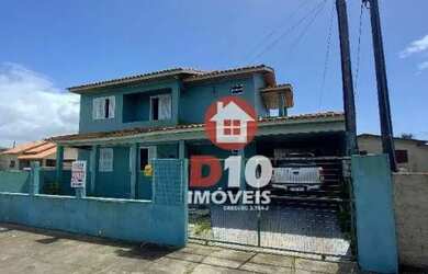 Imagem: A casa possui 3 Dormitórios, 2 Banheiros, 2 Vagas na garagem