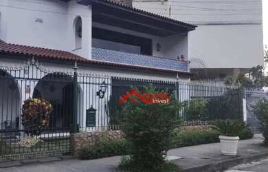 Imagem: A casa possui 3 Dormitórios, 5 Banheiros, 2 Vagas na garagem