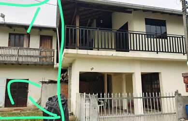 Imagem: A casa possui 1 Dormitório, 1 Banheiro, 1 Vaga na garagem