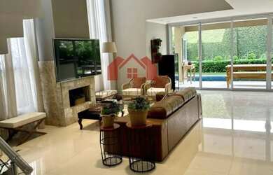 Imagem: A casa em condomínio possui 5 Dormitórios, 5 Banheiros, 4