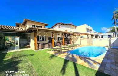 Imagem: A casa possui 5 Dormitórios, 5 Banheiros, 3 Vagas na garagem