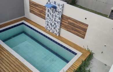 Imagem: A casa possui 4 Dormitórios, 2 Banheiros, 3 Vagas na garagem