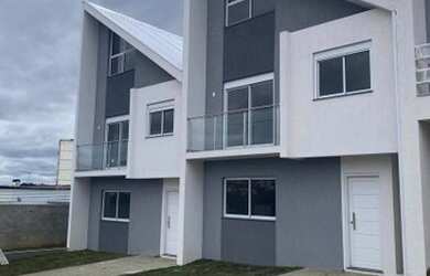 Imagem: A casa possui 3 Dormitórios, 1 Banheiro, 1 Vaga na garagem