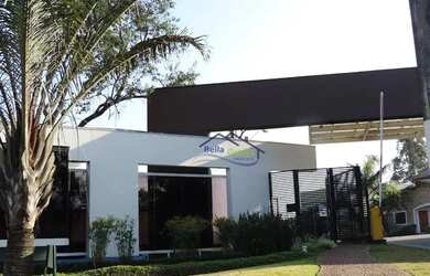 Imagem: A casa em condomínio possui 4 Dormitórios, 5 Banheiros, 630m²