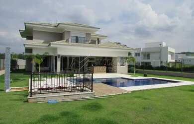 Imagem: A casa em condomínio possui 4 Dormitórios, 5 Banheiros, 5