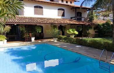 Imagem: A casa em condomínio à venda possui 5 Dormitórios, 3 Banheiros