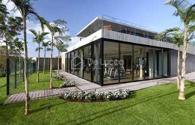 Imagem: A casa em condomínio possui 4 Dormitórios, 5 Banheiros, 4