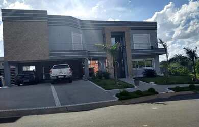 Imagem 2: Venda Casa com 430,00 metroQuadrado, 4 dormitório s , 3 vaga s . Swiss...