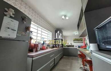 Imagem: A casa possui 5 Dormitórios, 5 Banheiros, 5 Vagas na garagem