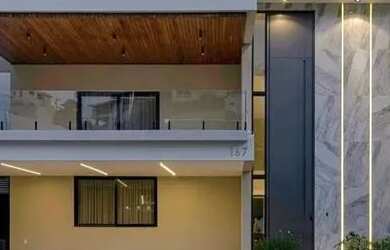 Imagem: A casa possui 4 Dormitórios, 5 Banheiros, 5 Vagas na garagem