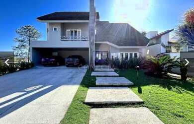 Imagem: A casa em condomínio possui 3 Dormitórios, 5 Banheiros, 4