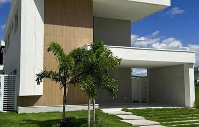 Imagem: A casa em condomínio e possui 4 Dormitórios, Suítes, 5 Banheiros