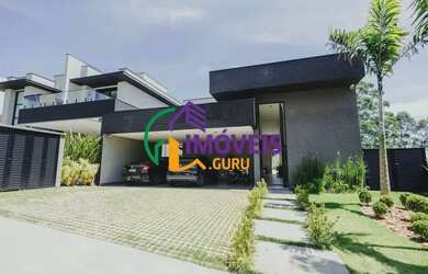 Imagem: A casa em condomínio possui 4 Dormitórios, 5 Banheiros, 5