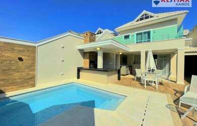 Imagem: A casa em condomínio possui 4 Dormitórios, 3 Banheiros, 5