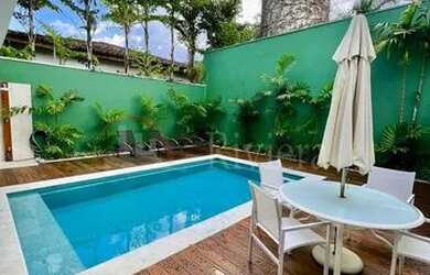 Imagem: A casa em condomínio possui 5 Dormitórios, 4 Banheiros, 3