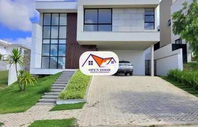 Imagem: A casa possui 4 Dormitórios, 5 Banheiros, 4 Vagas na garagem